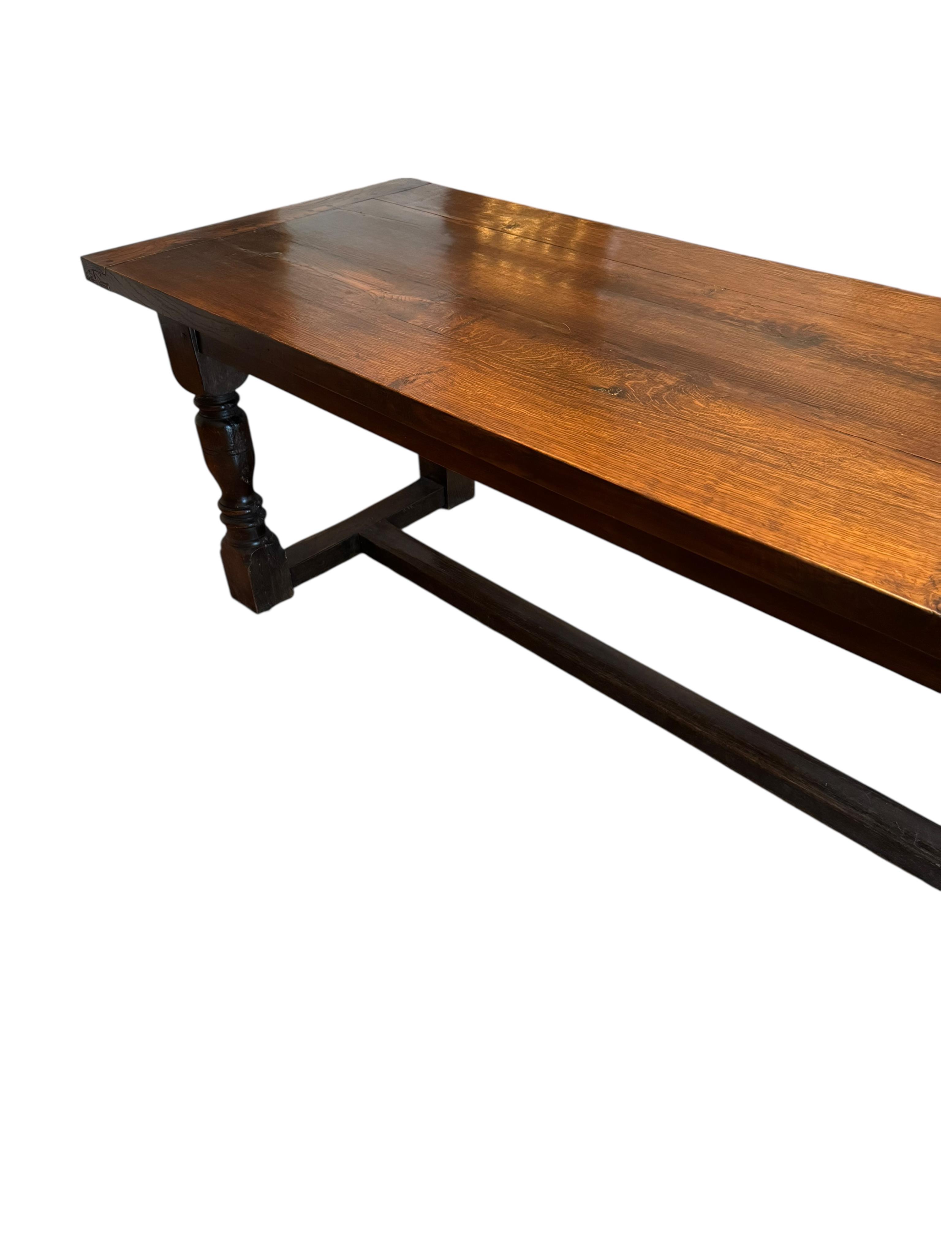An 18th century style rectangular oak Bevan Funnel mahogany table, width 274cm, depth 83cm, height 74cm